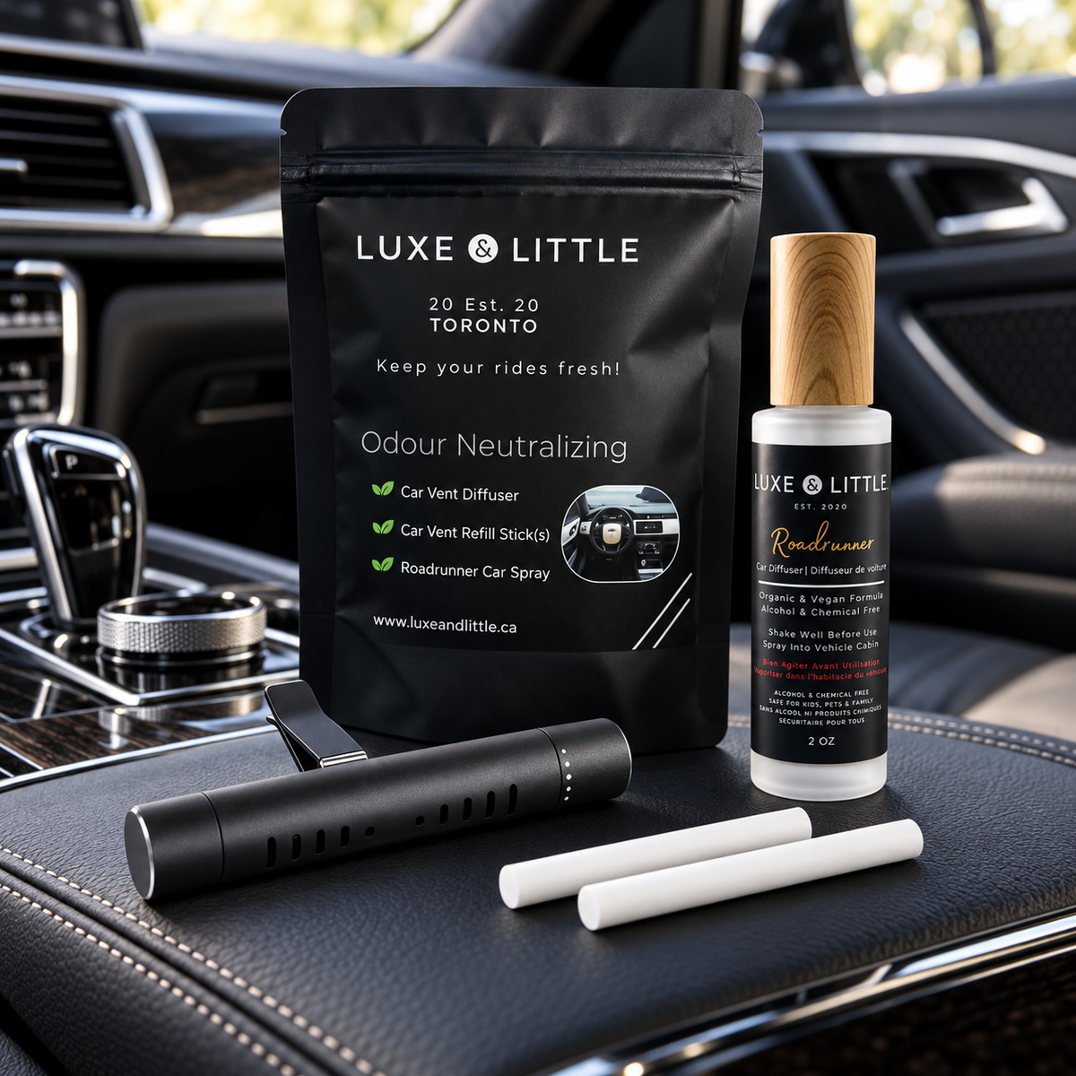 Luxe and Little Roadrunner Car Set with pouch, car spray, vent diffuser and refill sticks in a black car interior