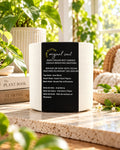 Luxe & Little Original scented soy candle in a botanical room setting
