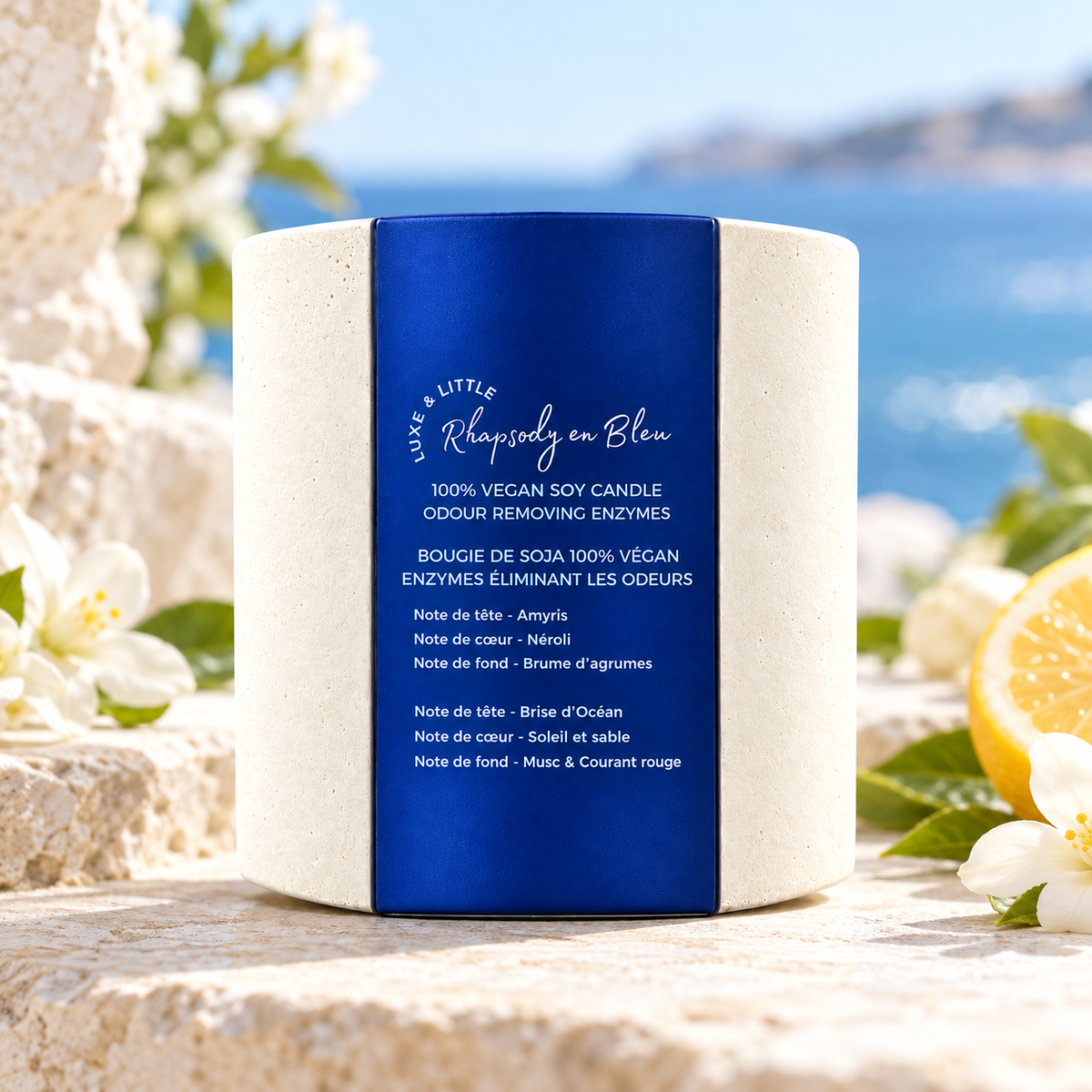 Rhapsody en Bleu candle in a coastal setting with blossoms and citrus