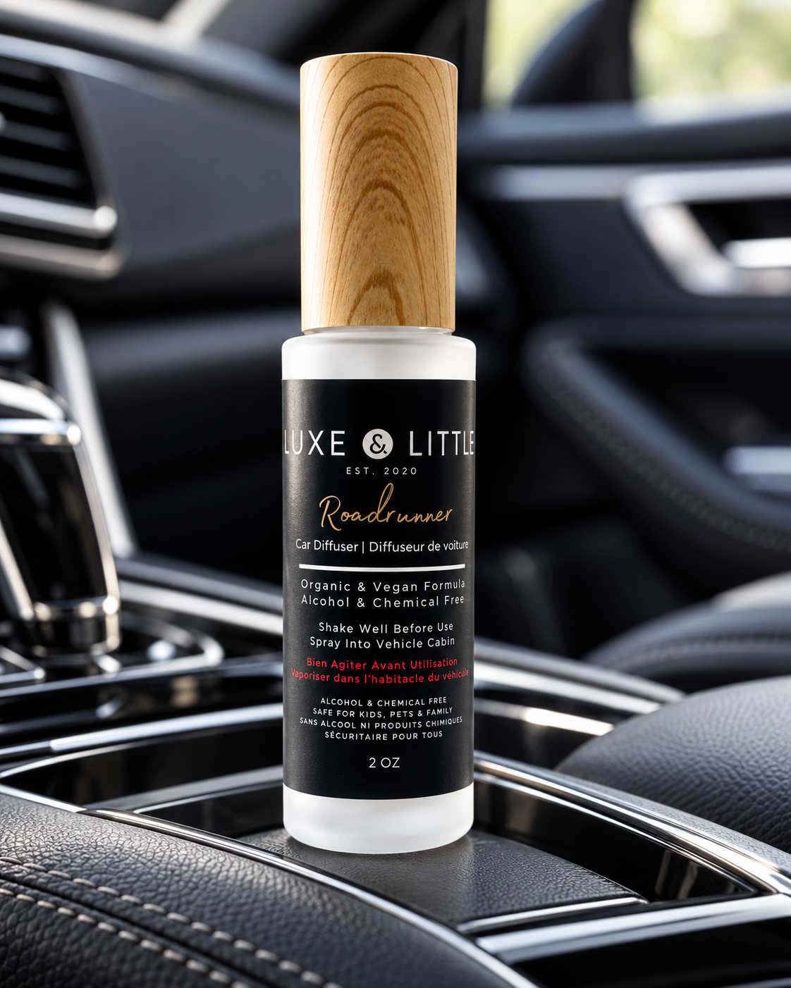 Roadrunner car spray product bottle on a black leather luxury car console