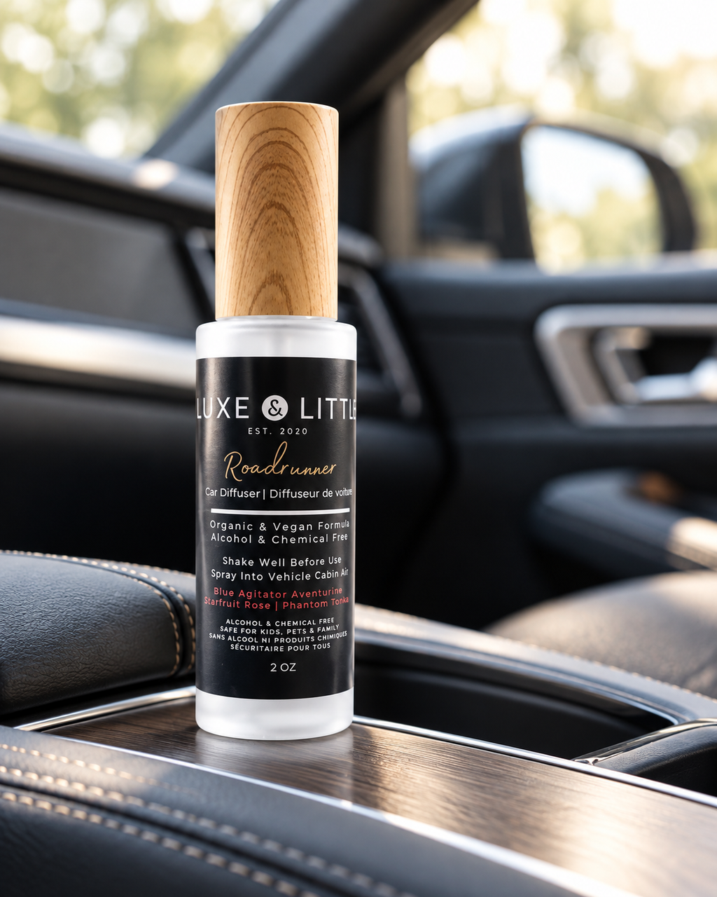 Luxe Roadrunner odour neutralizing spray with wooden cap on a vehicle's wood-trim console